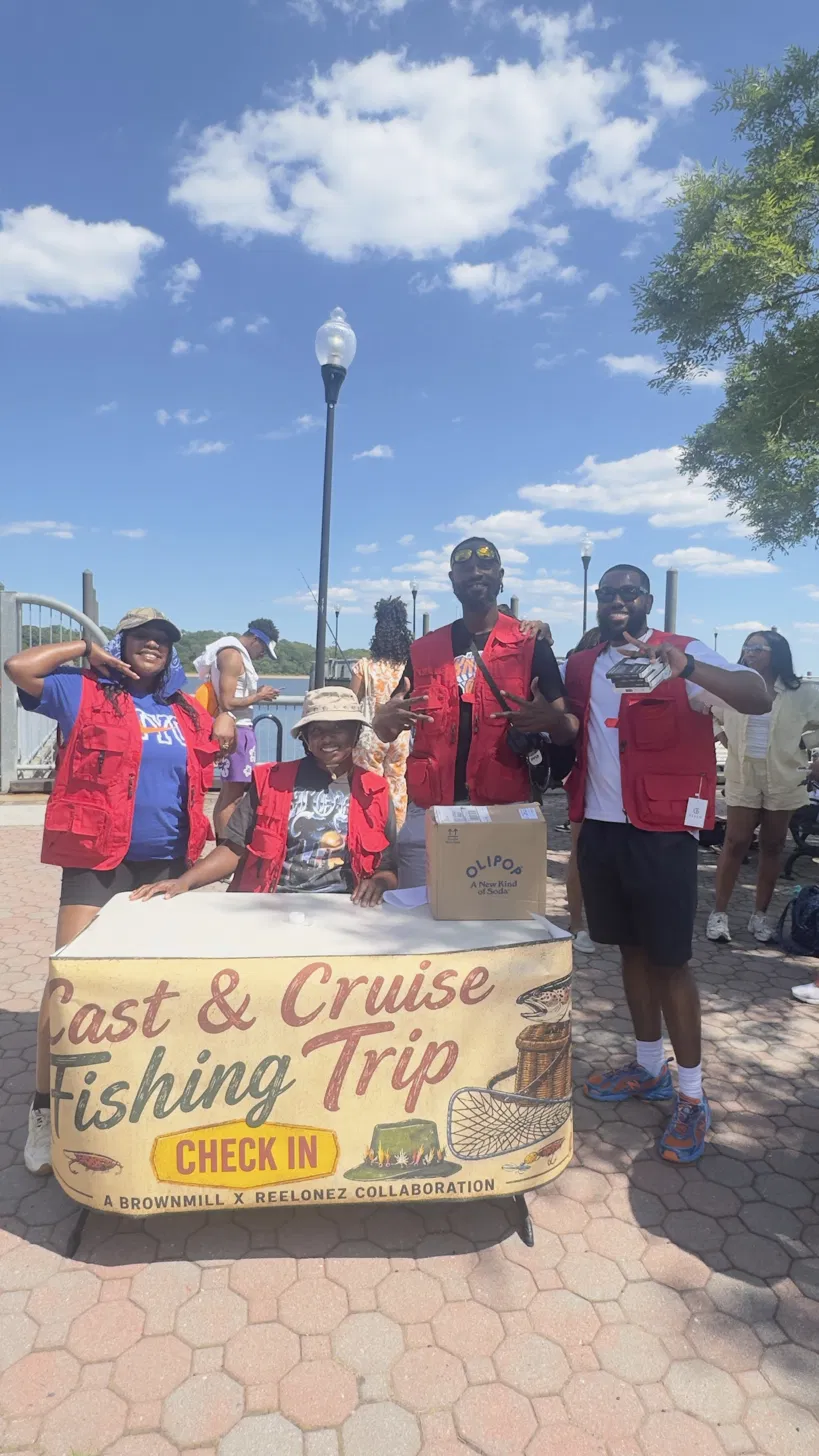 Cast & Cruise fishing trip check-in table